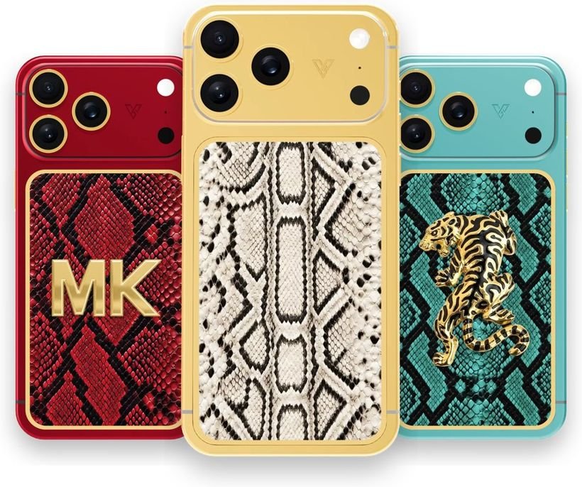Three iPhones designed at GoldPrivé: red with snake leather and gold initials, 24K gold with ivory snake leather, aqua with snake leather and a gold tiger