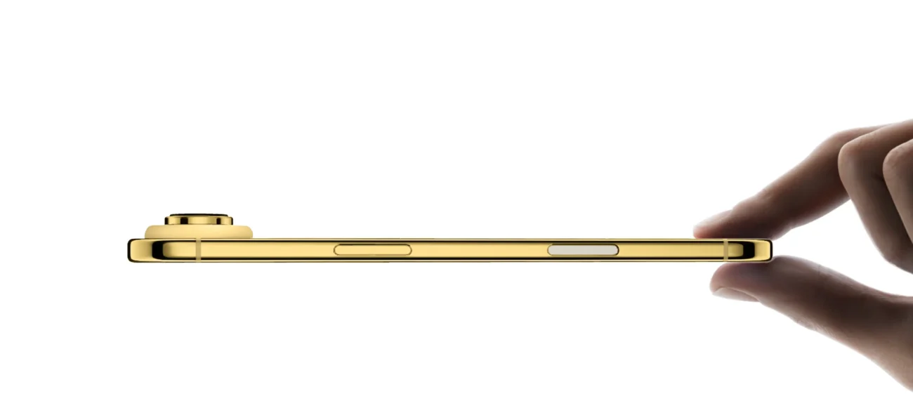 Ultra-thin 24K Gold iPhone Air frame held between two fingers