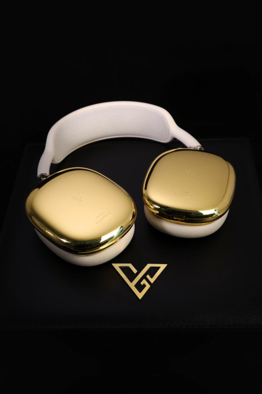 Gold AirPods Max 2 headphones on a black background
