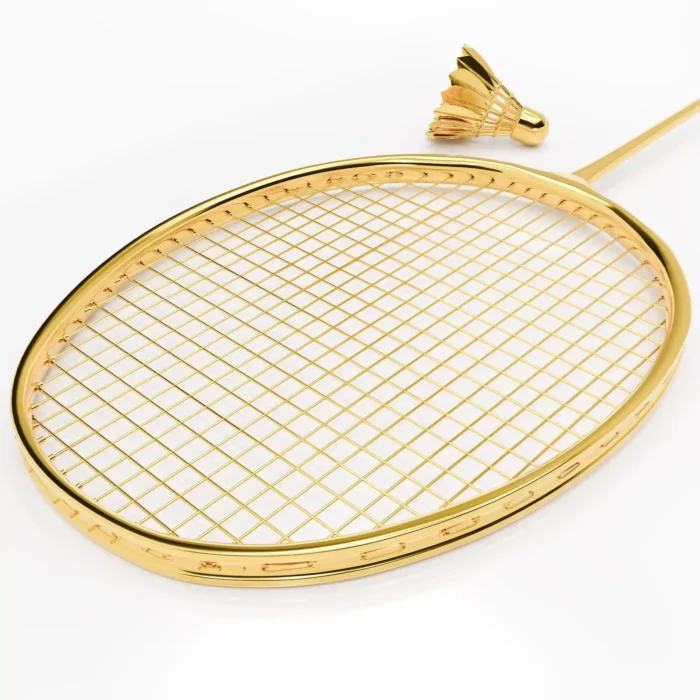 The gold head and string bed of the 24K Gold Badminton Set with the matching gold shuttlecock behind it
