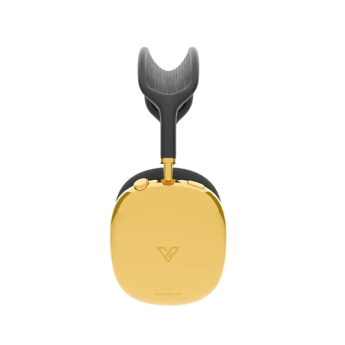 Gold AirPods Max 2 Midnight from the side, one mirror 24K Gold ear cup carrying the maker's mark, its gold arm leading up to the dark headband