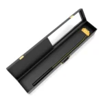 Gold PING DS72 Putter lying in its open black presentation case, the raised lid showing its clear window, with the black grip at one end and the plated mallet head at the other