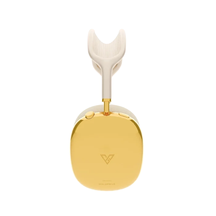 Gold AirPods Max 2 Starlight in side view, a single 24K Gold ear cup showing the maker's mark, with the gold arm rising into the ivory headband