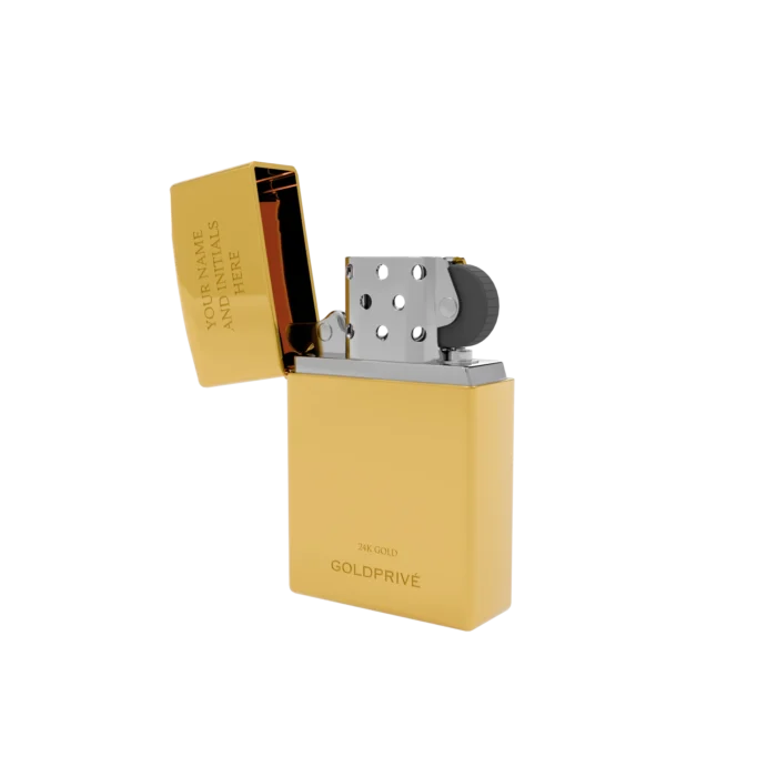 Gold Zippo Lighter with its lid flipped open, the 24K Gold case engraved with sample text and the silver chimney and dark flint wheel of the insert showing