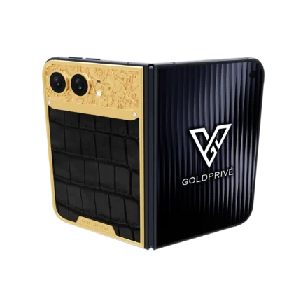 Exotic Royale Gold iPhone Duo opened flat with baroque-engraved gold above a black crocodile leather panel