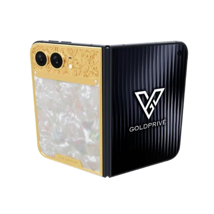Royale Gold iPhone Duo opened flat with baroque engraved gold above a mother of pearl panel