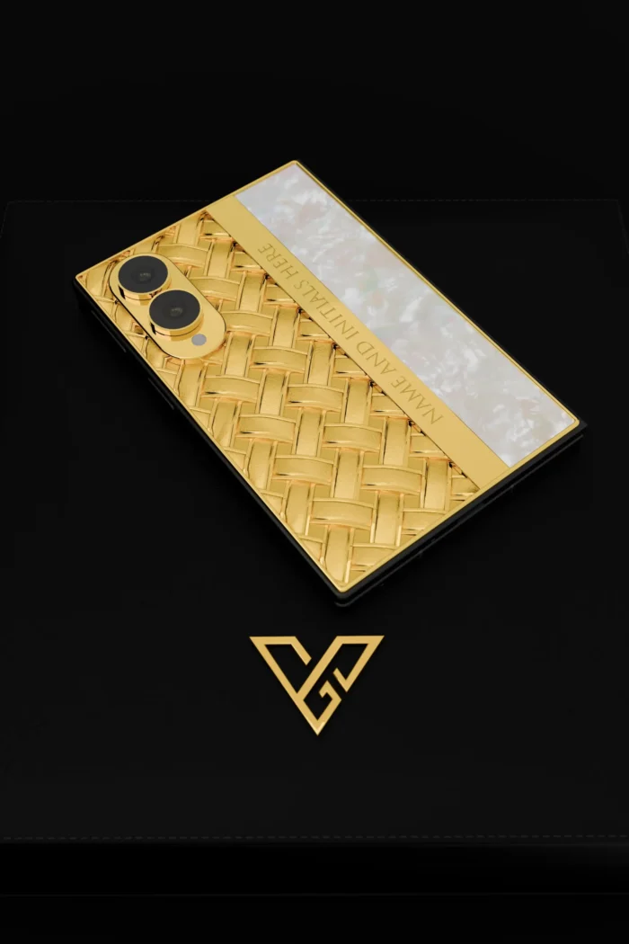Knots & Pearl Gold Galaxy Z Fold8 close-up in 24K Gold of the raised weave, the name bar and the pearl column