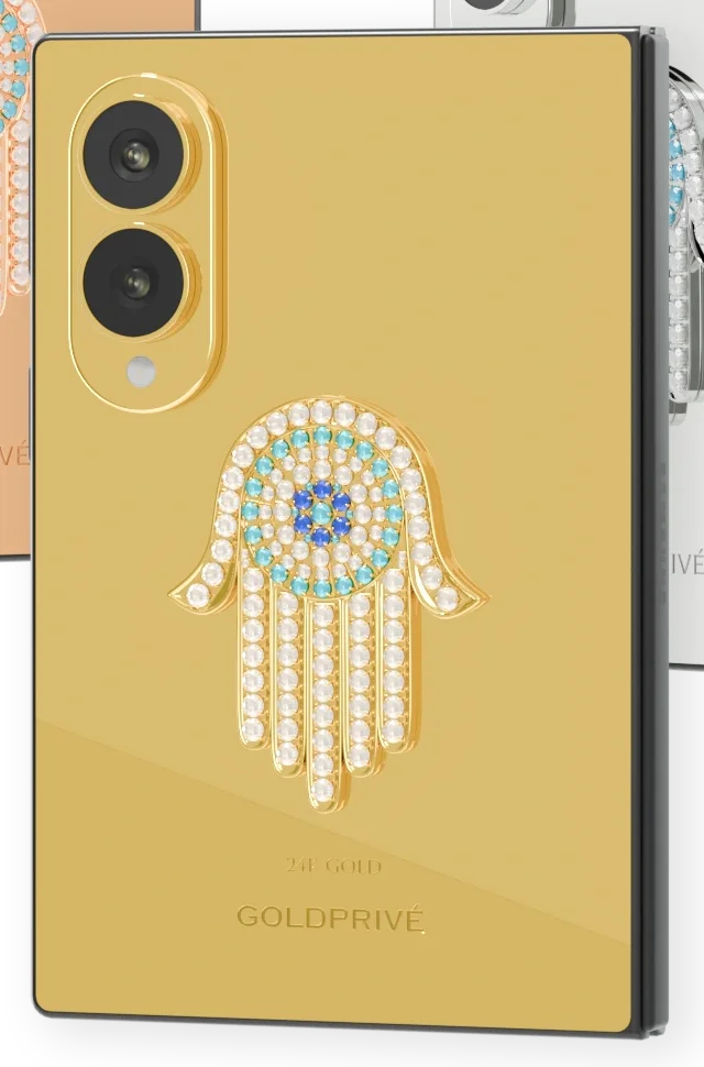 Hamsa Eye Amulet Galaxy Z Fold8 close-up of the turquoise ring and deep blue eye inside the white-stone hamsa on 24K Gold